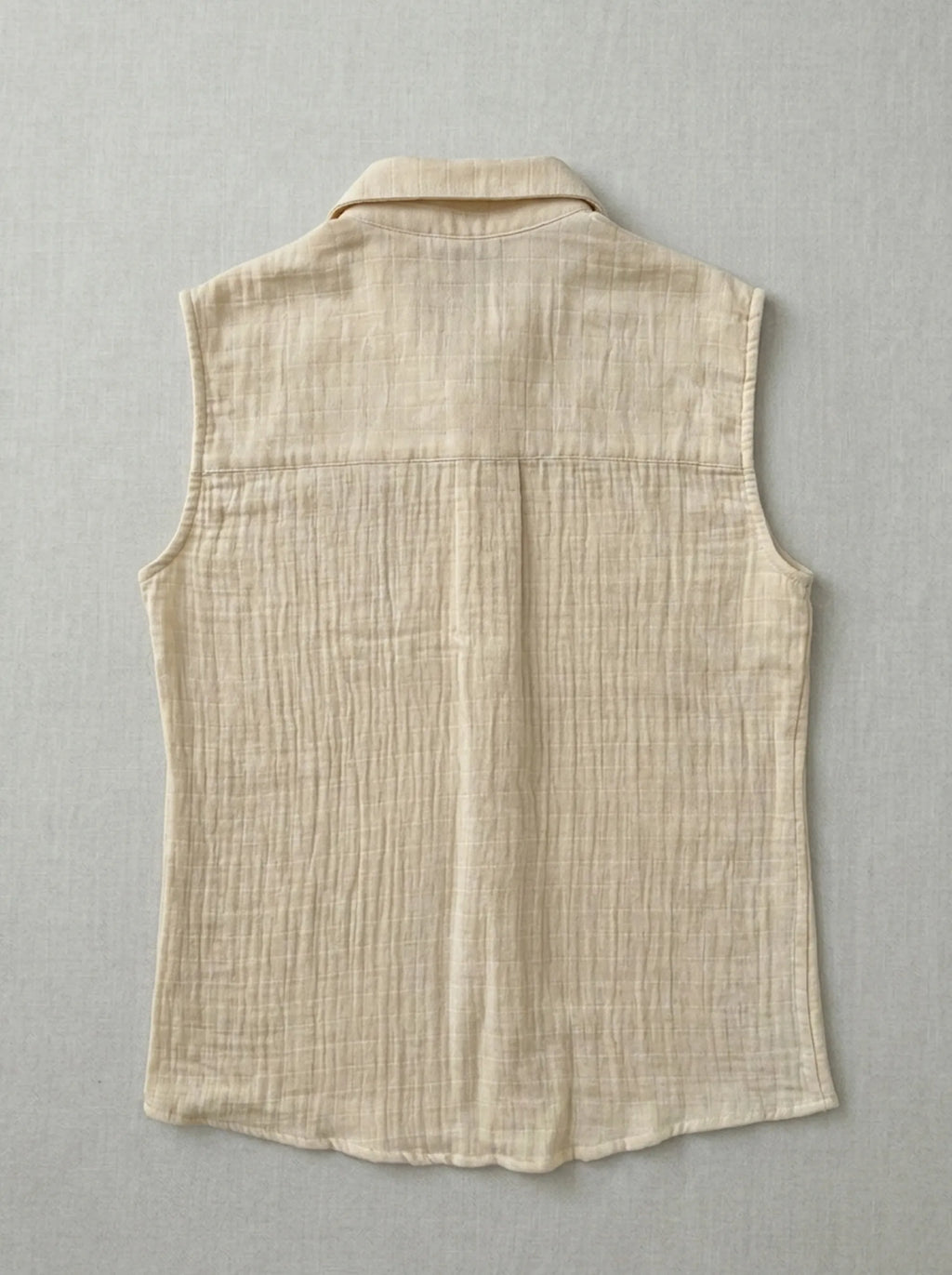 Model wearing Atlas Vest artisanal menswear sustainable fashion textured garment Tumulto