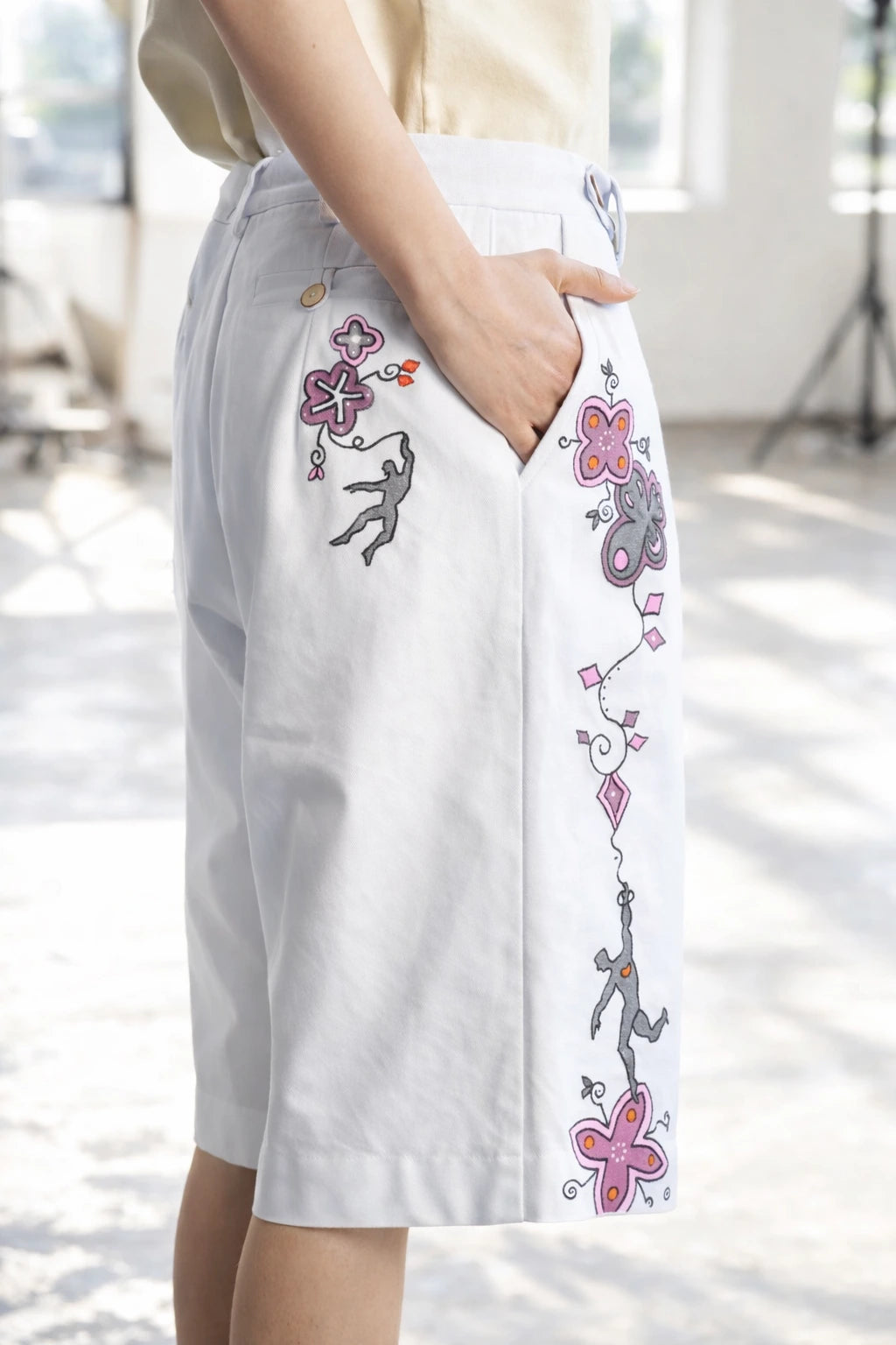 Close-up of organic textured fabric Flowers Shorts artisanal clothing