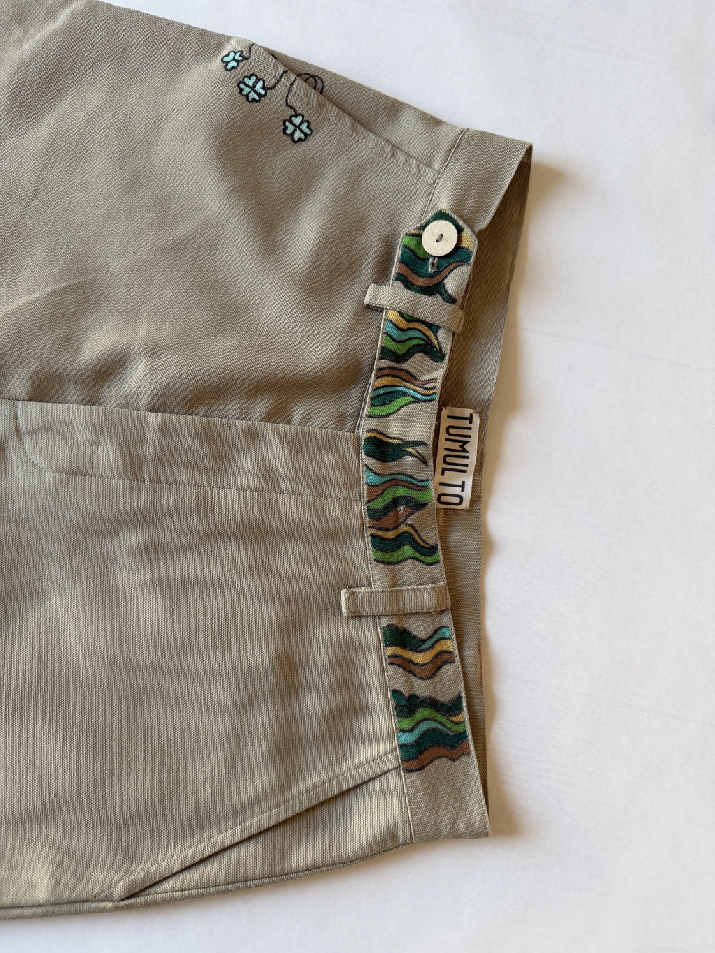 Artisanal men's chinos with natural textures sustainable European fashion design