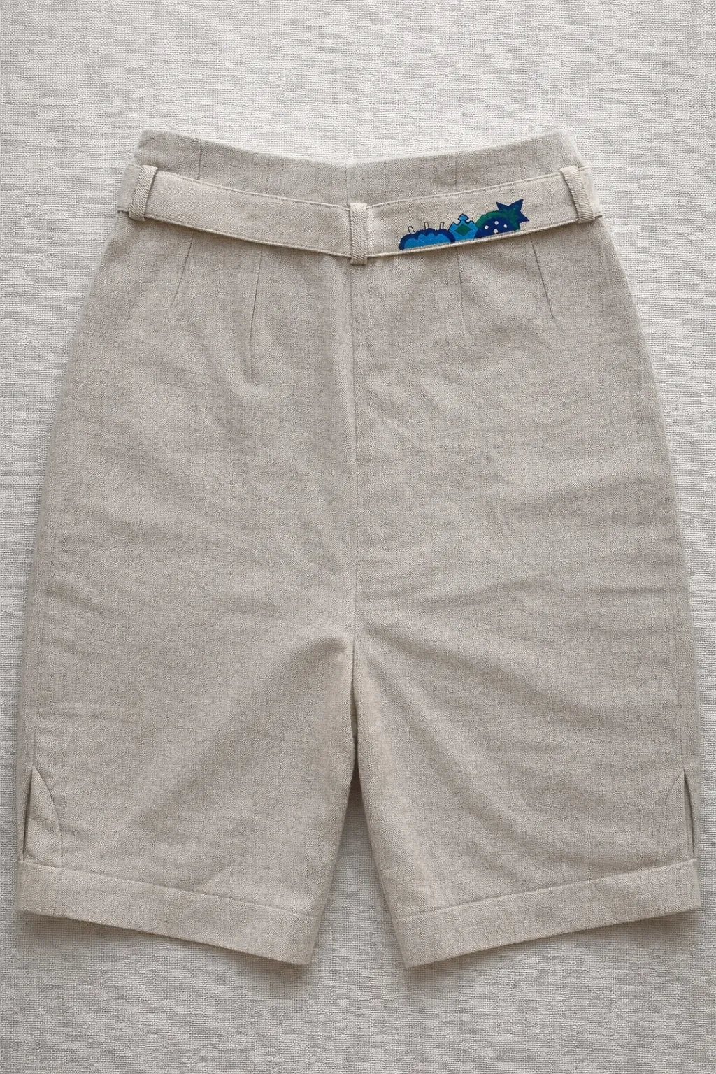 Close-up of organic textured fabric used in handmade Hills shorts by Tumulto artisanal fashion