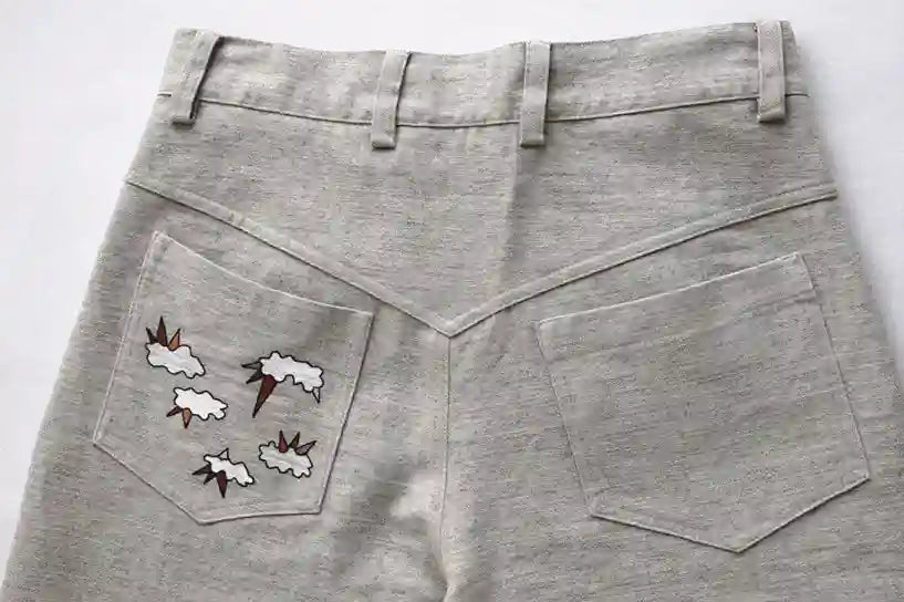 Handcrafted Icarus trousers textured artisanal fashion by Tumulto