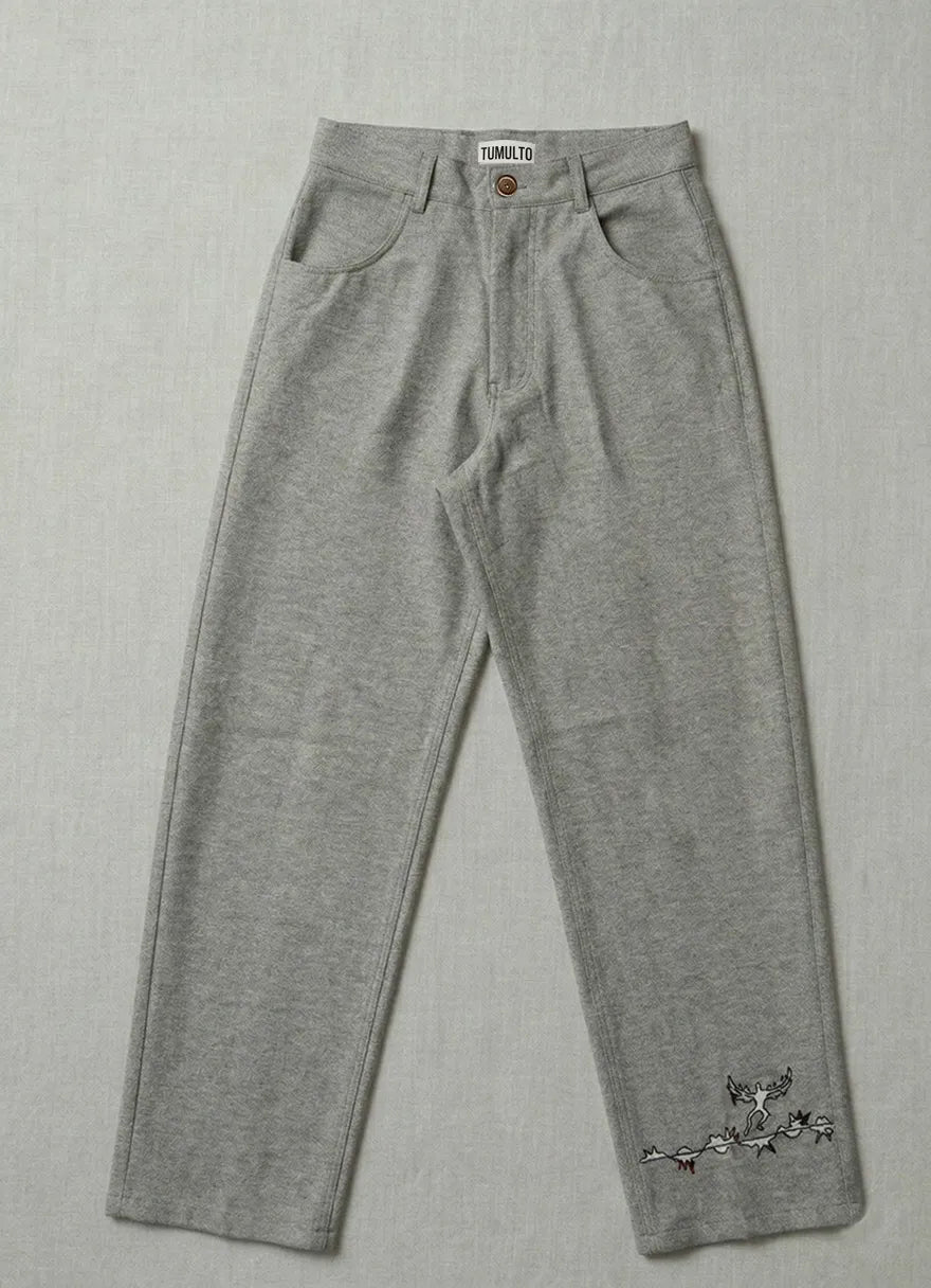 Handcrafted Icarus trousers textured artisanal fashion by Tumulto sustainable clothing brand