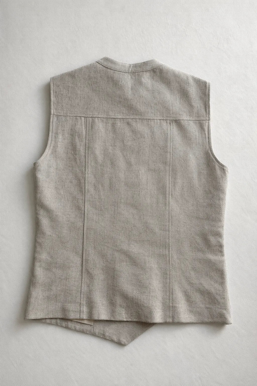 Close-up detail of handcrafted textile texture sustainable fashion menswear vest Tumulto