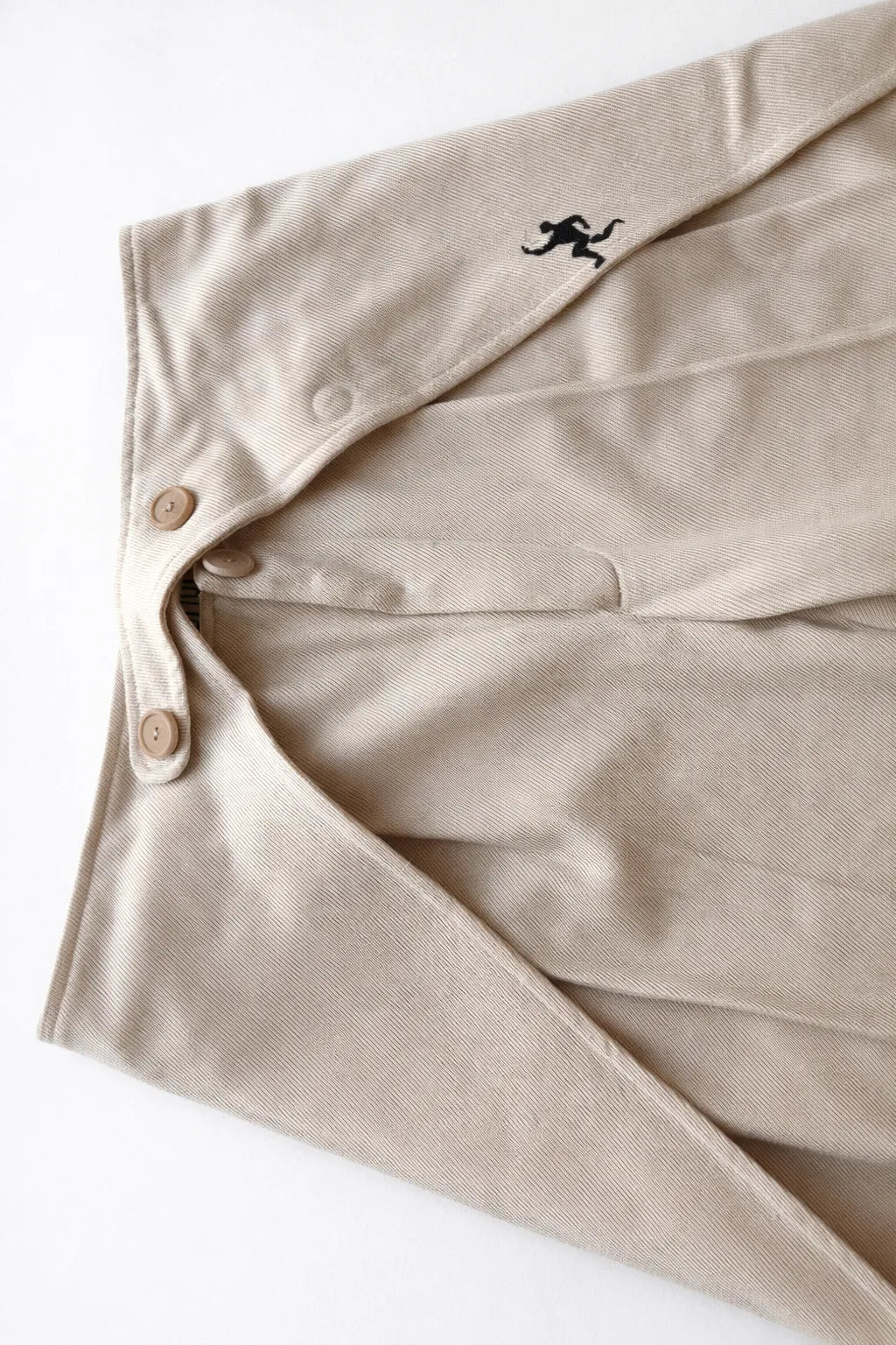 Ometto wrap front trousers artisanal textured menswear by Tumulto