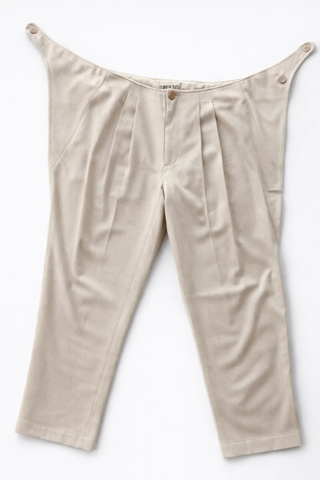 handcrafted wrap front trousers sustainable organic inspired fabric Tumulto