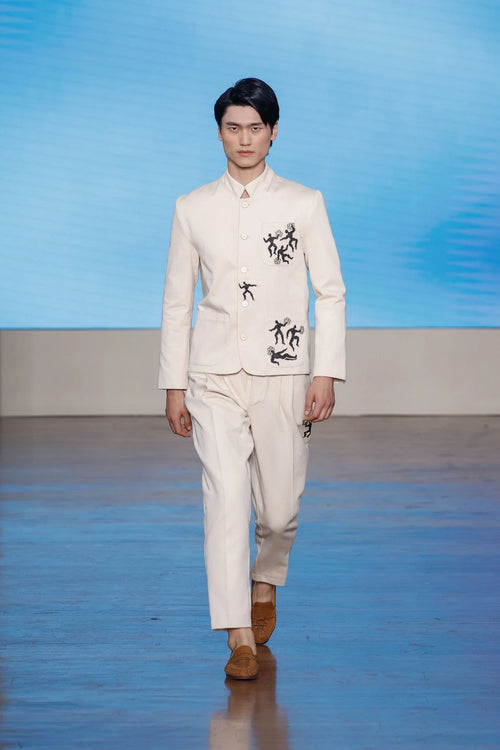 Artisanal flower trousers crafted from organic materials and raw textiles