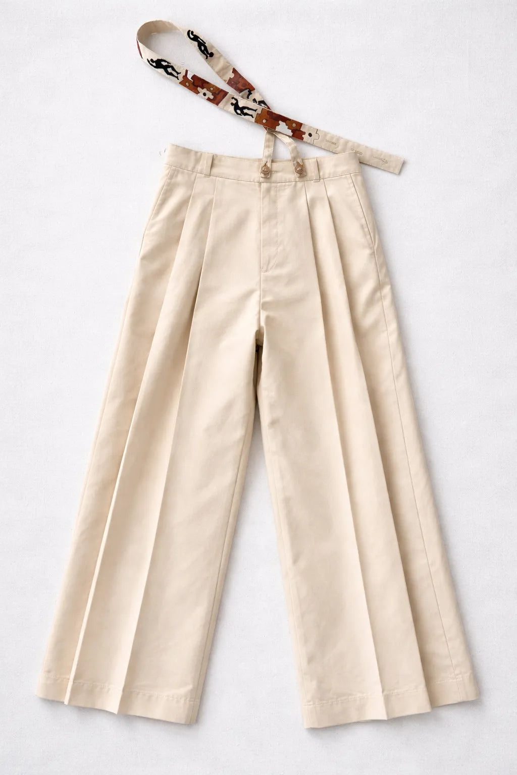 Puzzle Plissé Trousers textured artisanal clothing by Tumulto sustainable fashion brand