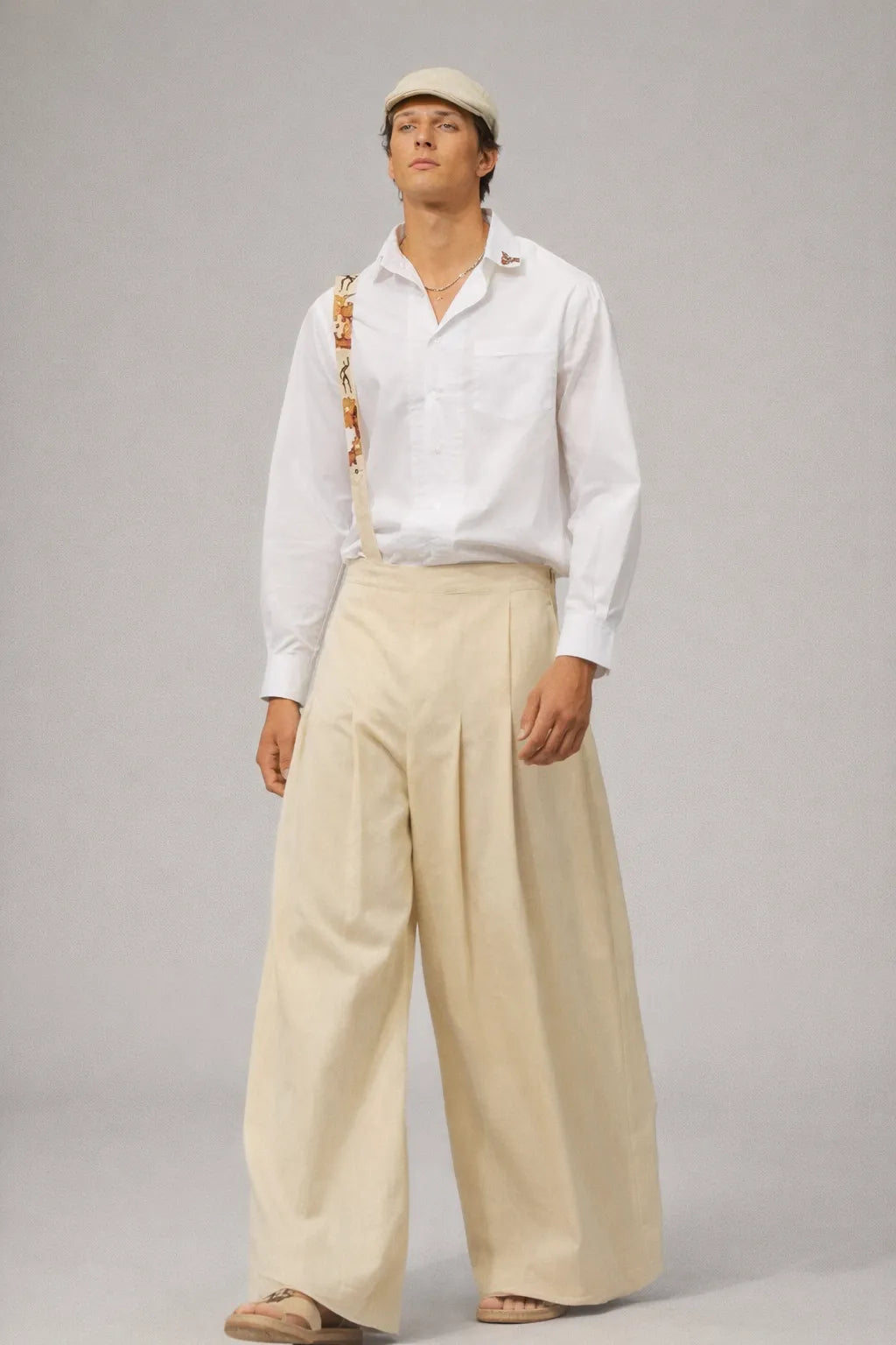 Handcrafted plissé trousers with organic textured fabric sustainable menswear Tumulto