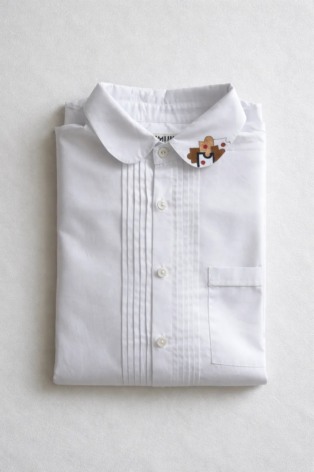 Handmade textured Puzzle Shirt by Tumulto crafted from organic sustainable materials artisanal fashion piece