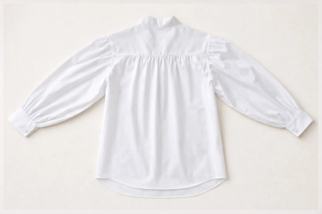 Textured fabric detail of handmade wide sleeve shirt sustainable fashion